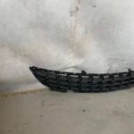 Dolna kratka zderzaka przedniego Opel Corsa D 13389555 2006-2014