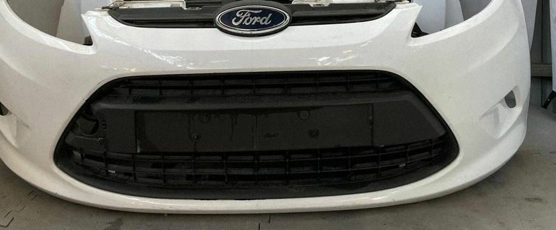 Zderzak przedni Ford Fiesta 8A6117F003 2009-2012 7VTA