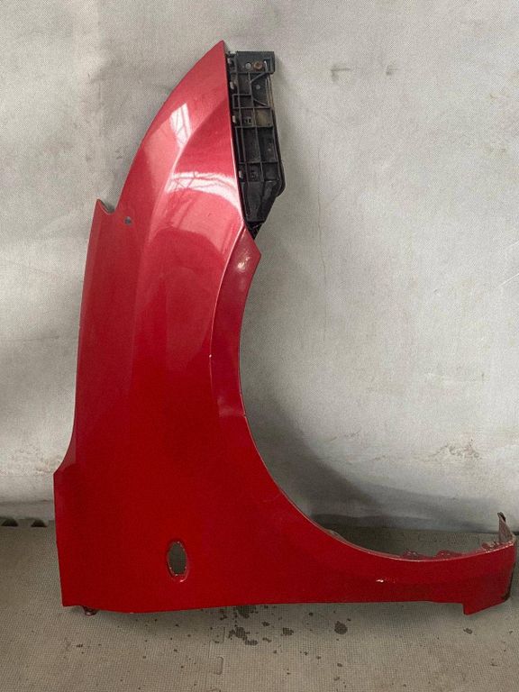 Błotnik prawy Suzuki Swift II 5761163J01 2010-2016