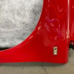 Błotnik lewy Opel Corsa D 2006-2014 13180479 Z547