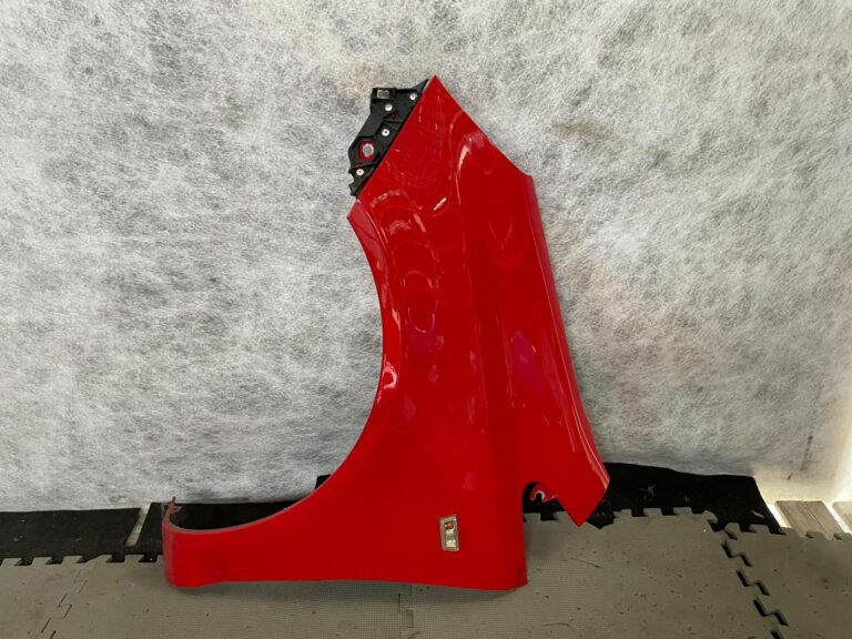 Błotnik lewy Opel Corsa D 2006-2014 13180479 Z547